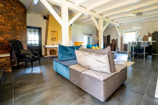 Maison de caractère de 261 m² sur 20 ares avec espaces de vie remarquables