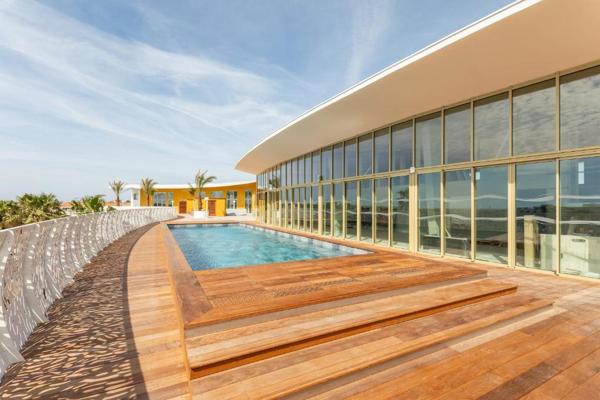 CAP D'AGDE. Village Naturiste. Duplex T2 en Rooftop avec Piscine, Jacuzzis et Garage Privatif