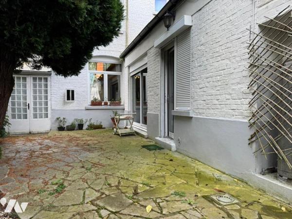 Maison de ville 4 chambres jardin et garage.