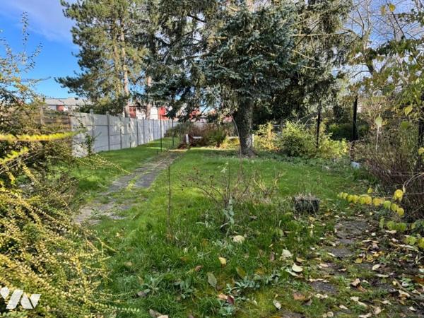 Maison de ville 4 chambres jardin et garage.