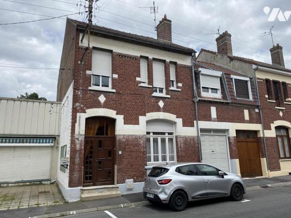 Maison de ville 4 chambres jardin et garage.