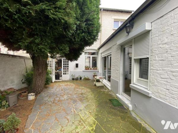 Maison de ville 4 chambres jardin et garage.