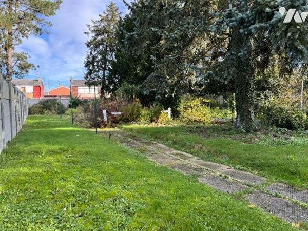 Maison de ville 4 chambres jardin et garage.