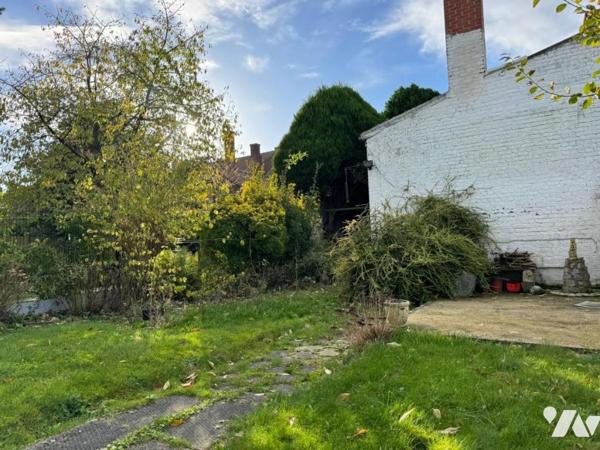 Maison de ville 4 chambres jardin et garage.