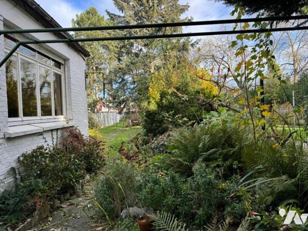 Maison de ville 4 chambres jardin et garage.