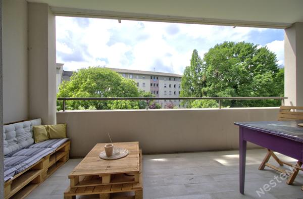 AGEN - Appartement T3 lumineux de 69 m² avec terrasse couverte, ascenseur et place de parking en sous-sol.