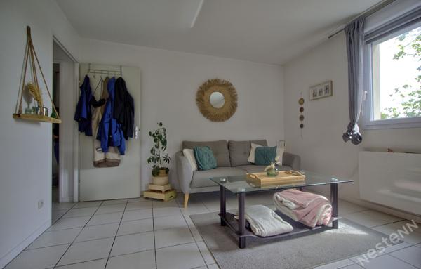 AGEN - Appartement T3 lumineux de 69 m² avec terrasse couverte, ascenseur et place de parking en sous-sol.