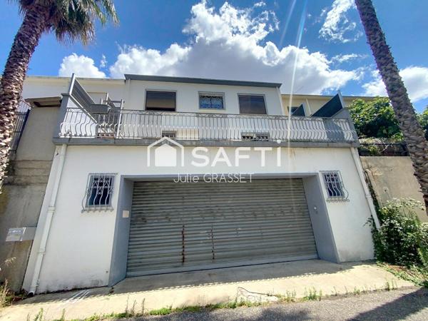 MAISON AVEC EXTERIEURS ET GARAGE D ENVIRON 130 m²