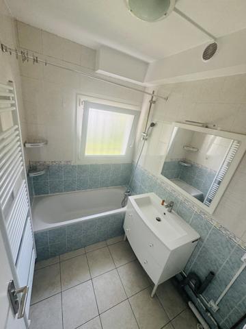 Appartement 3 pièces 59 m2 rdc avec jardinet