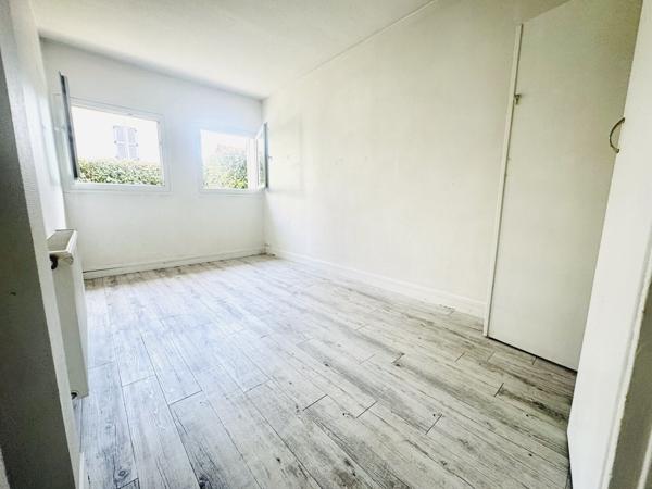 Appartement 3 pièces 59 m2 rdc avec jardinet