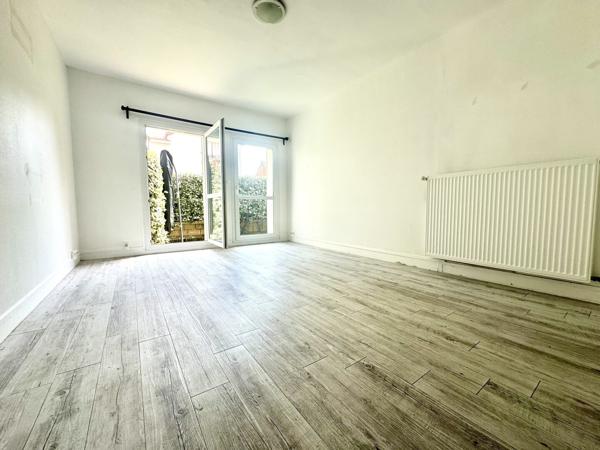 Appartement 3 pièces 59 m2 rdc avec jardinet