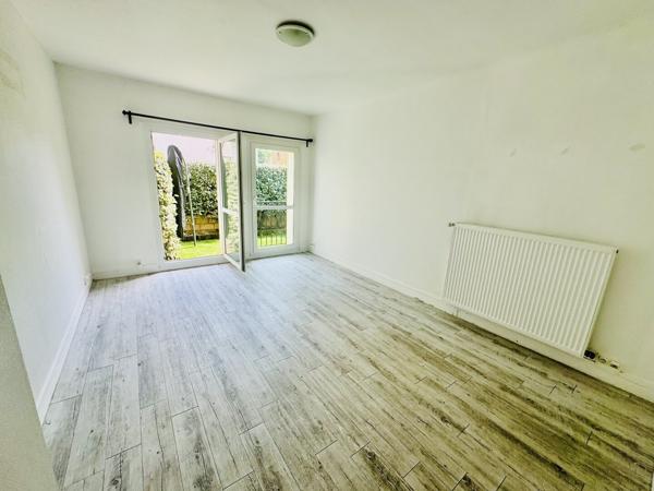 Appartement 3 pièces 59 m2 rdc avec jardinet