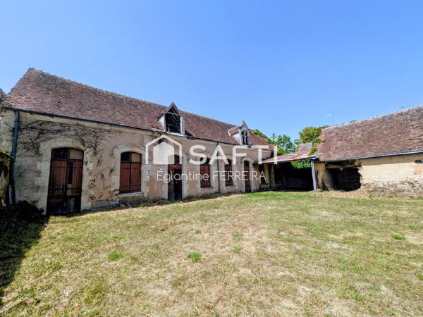 COMMUNE DE GRACAY, ENSEMBLE EN PIERRE AVEC JARDIN.