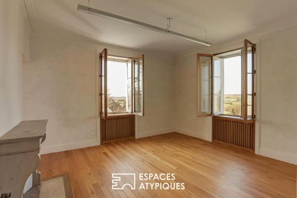 Ancien presbytère rénové sur les hauteurs d’un village de caractère