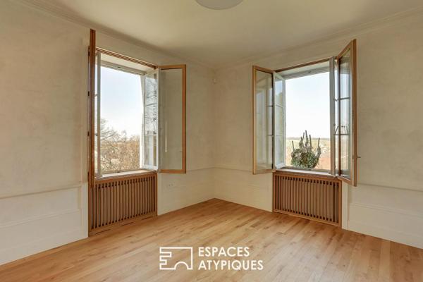 Ancien presbytère rénové sur les hauteurs d’un village de caractère