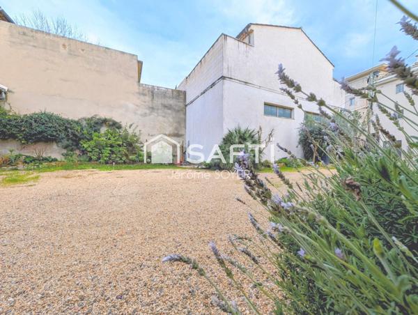 ENSEMBLE DE 2 MAISONS + HANGAR EN CENTRE-VILLE