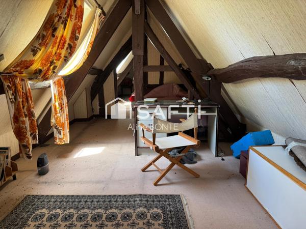 Typique longère normande avec verger et garage