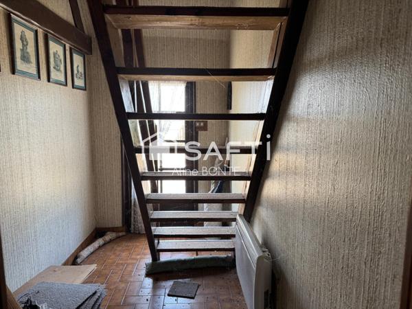 Typique longère normande avec verger et garage