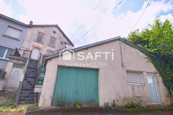 Immeuble avec 5 appartements et 1 garage!