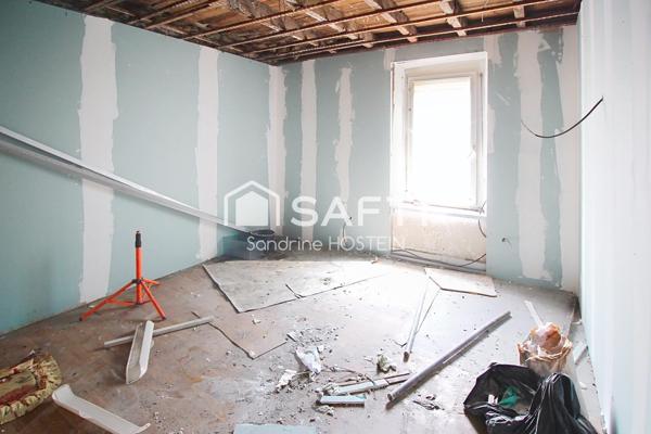 Immeuble avec 5 appartements et 1 garage!