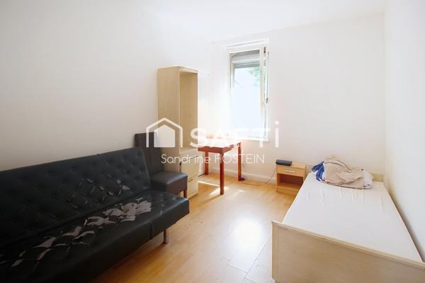 Immeuble avec 5 appartements et 1 garage!