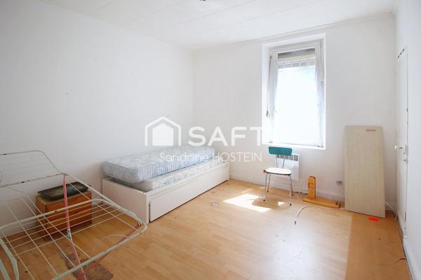 Immeuble avec 5 appartements et 1 garage!