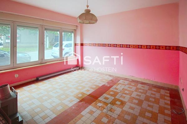 Immeuble avec 5 appartements et 1 garage!