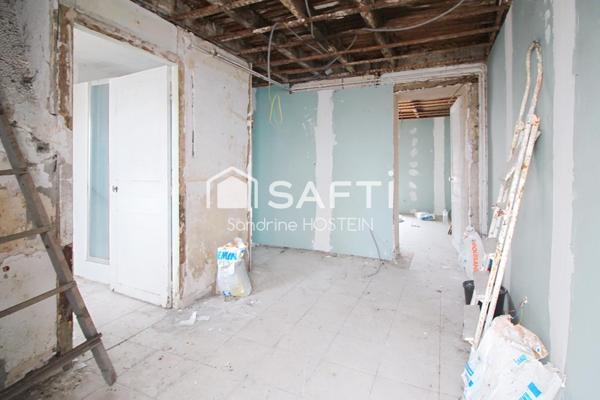 Immeuble avec 5 appartements et 1 garage!