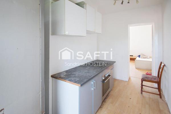 Immeuble avec 5 appartements et 1 garage!