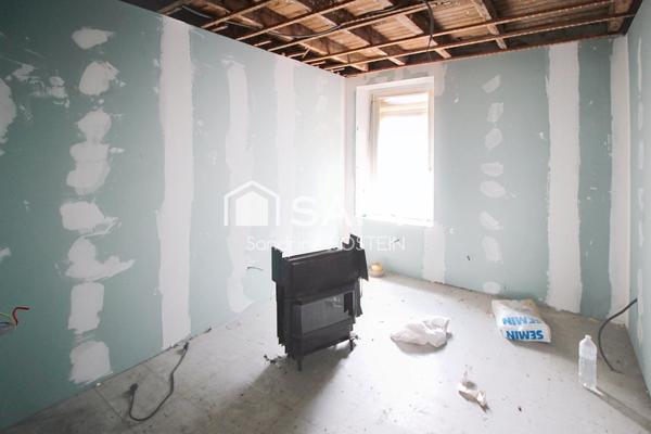 Immeuble avec 5 appartements et 1 garage!