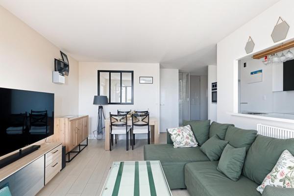 Appartement 3 pièces avec balcon cave et 2 stationnements