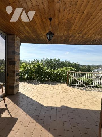 Maison d'habitation + parcelle de terrain constructible