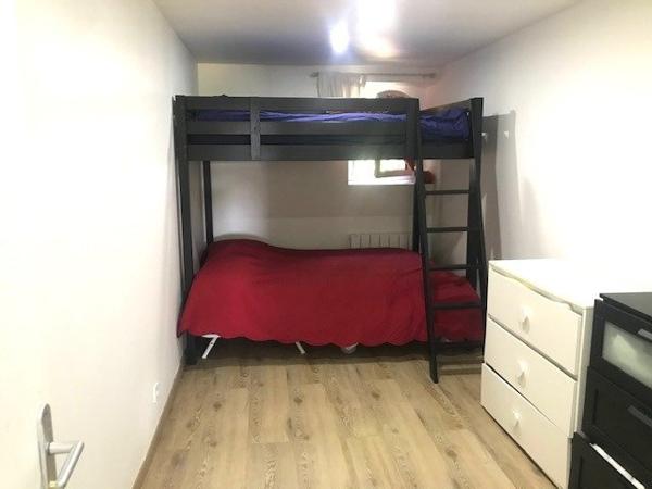 Appartement trois pièces en rez-de-jardin 