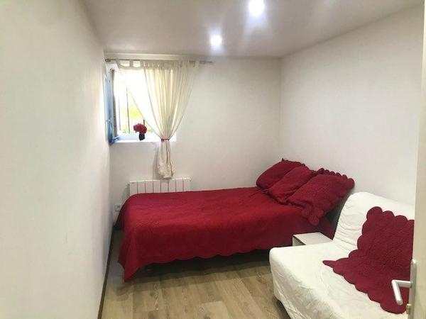 Appartement trois pièces en rez-de-jardin 