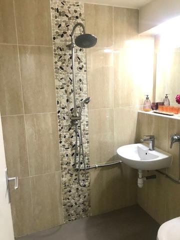 Appartement trois pièces en rez-de-jardin 