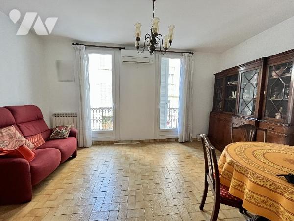 Maison de ville divisée en 2 appartements (61 et 60 m²) avec garage de 60 m² en rez-de-chaussée