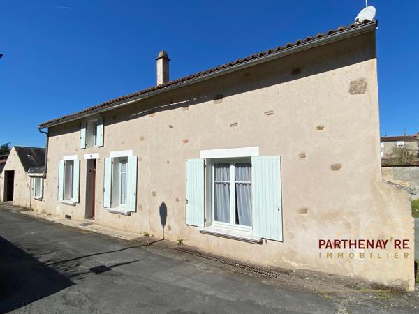 Maison de ville à rafraichir avec garage