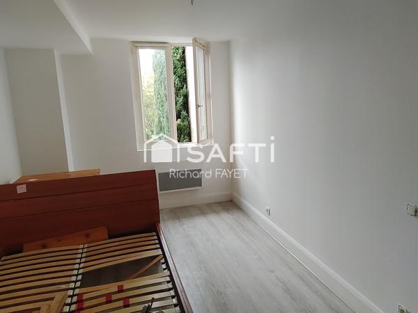 Immeuble centre de Jonzac avec jardin