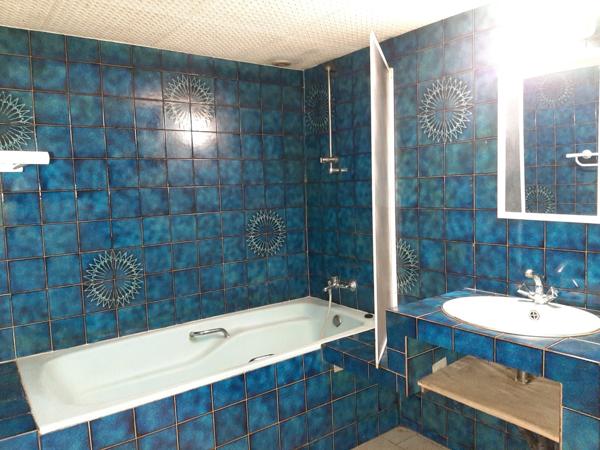 MAISON INDIVIDUELLE DANS UN ÉCRIN DE VERDURE