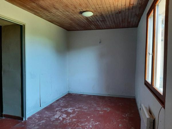 MAISON INDIVIDUELLE DANS UN ÉCRIN DE VERDURE