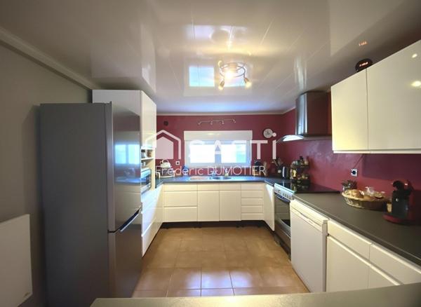 Maison habitable de plain-pied avec garage et jardin