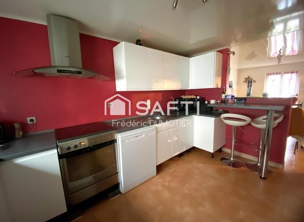 Maison habitable de plain-pied avec garage et jardin