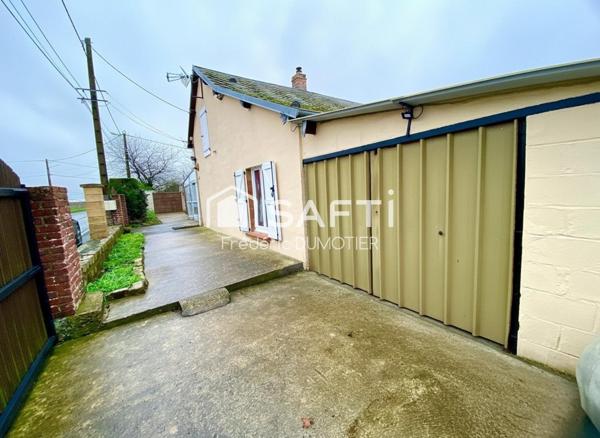 Maison habitable de plain-pied avec garage et jardin