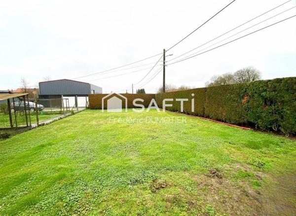 Maison habitable de plain-pied avec garage et jardin