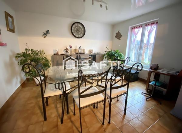 Maison habitable de plain-pied avec garage et jardin