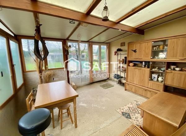 Maison habitable de plain-pied avec garage et jardin