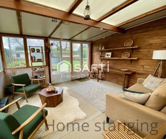 Maison habitable de plain-pied avec garage et jardin