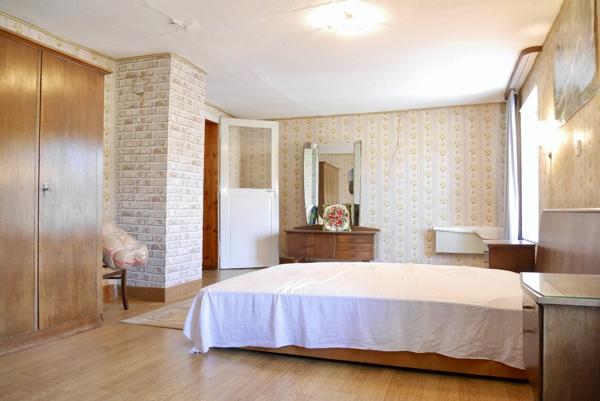 MAISON DE VILLAGE AVEC JARDIN