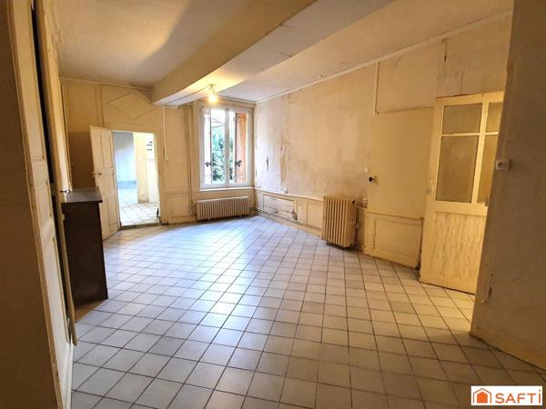 Maison mitoyenne de deux appartements