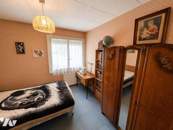 Maison de type T5 avec garage et jardin dans l'ensemble les Ensanges